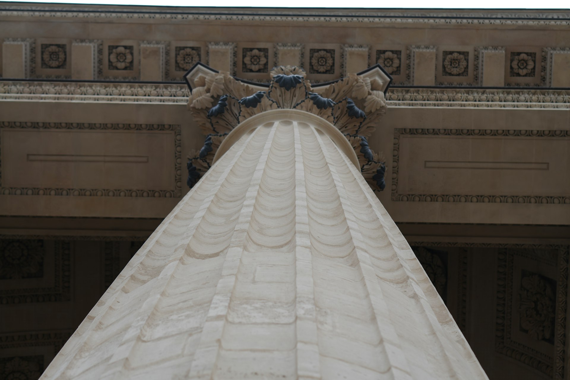 Hand-finished fluted stone column detail