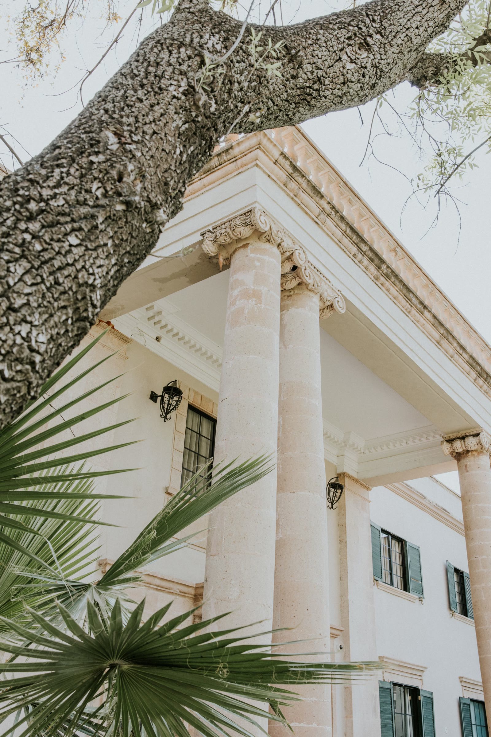 Grand stone columns framing a villa entrance