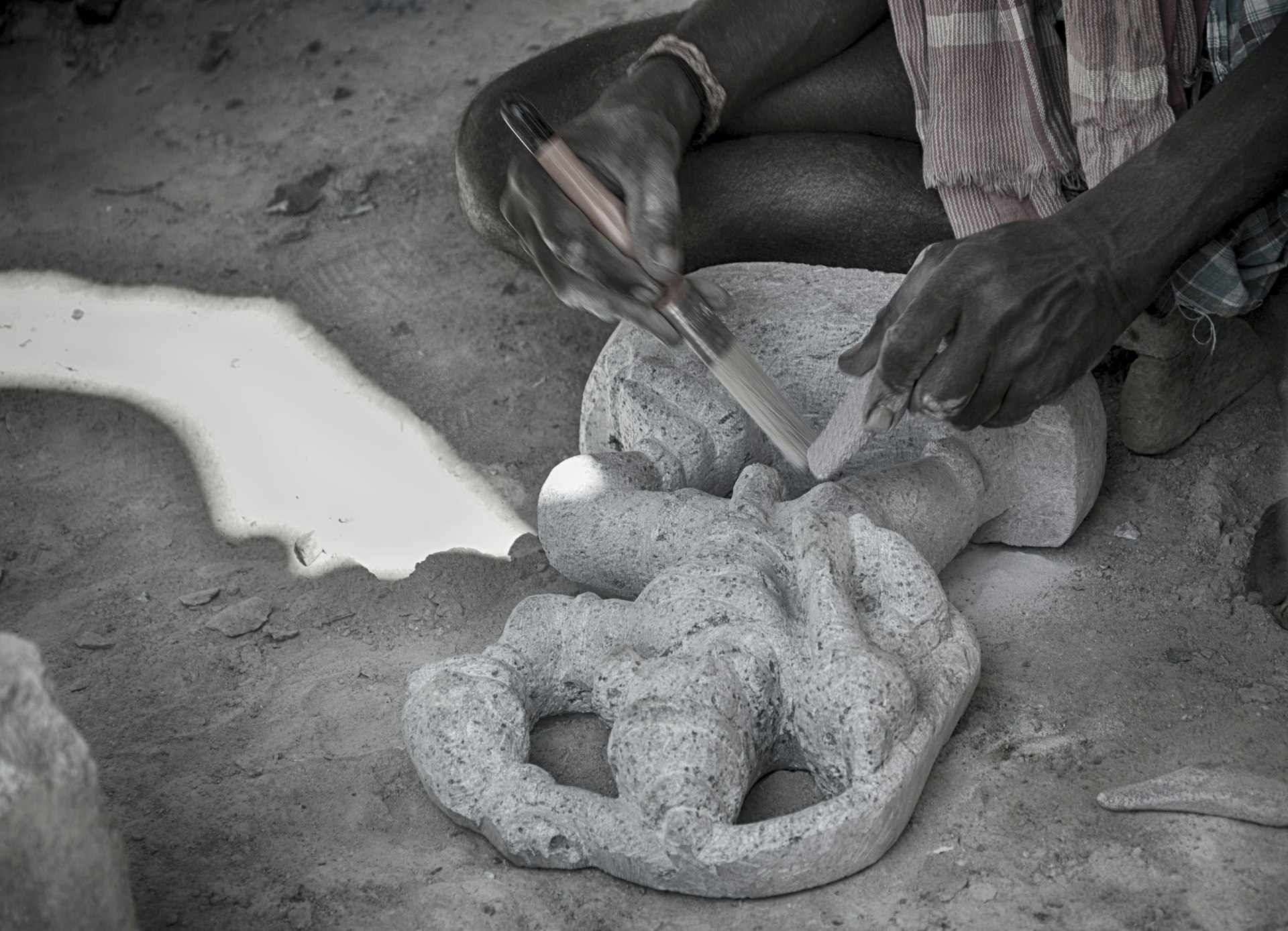 Artisan hand-carving stone detail, Stonosphere heritage craftsmanship